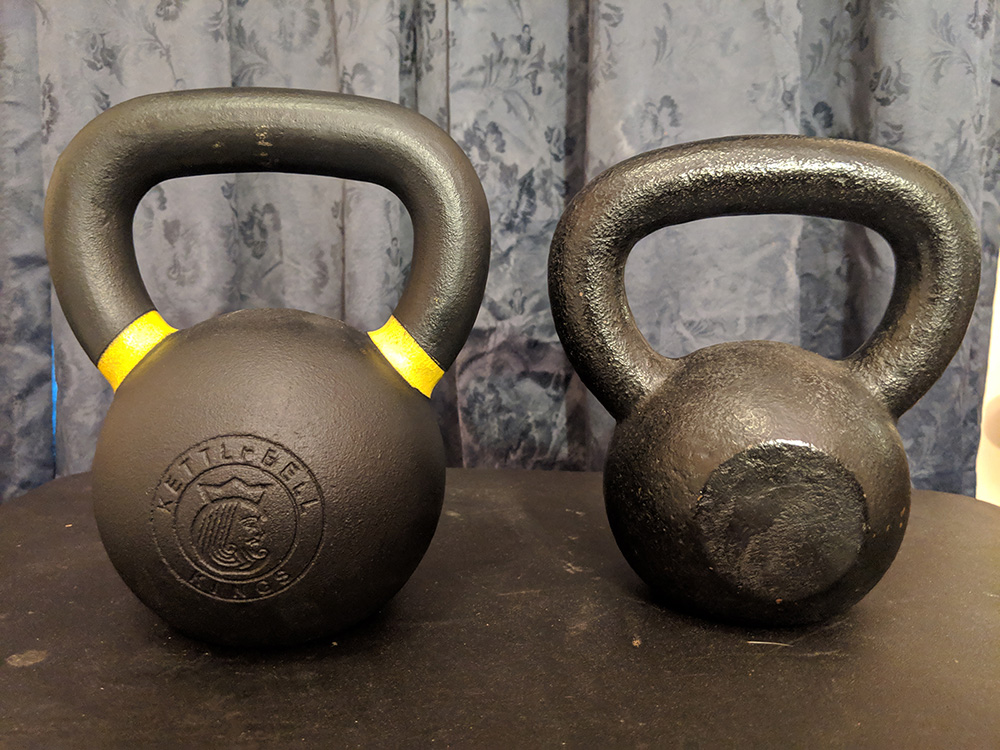 Powder Coated Kettlebell vs. Traditional Cast Iron Kettlebell Powder Coated Kettlebell vs. Traditional Cast Iron Kettlebell
