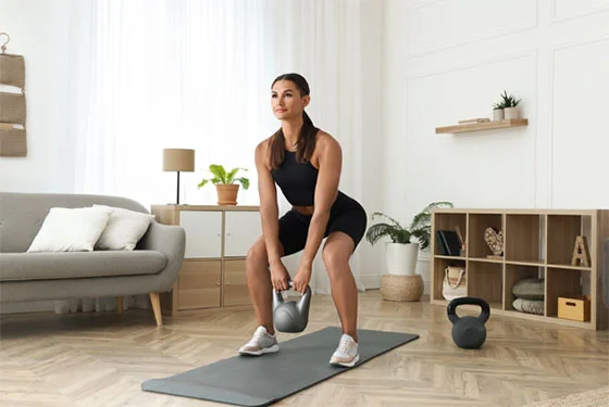 Two-Arm Kettlebell Swing Two-Arm Kettlebell Swing