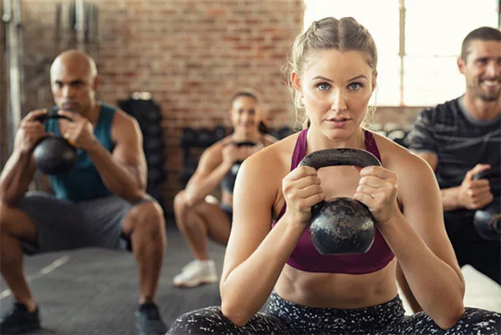 Squatting With Kettlebells Squatting With Kettlebells