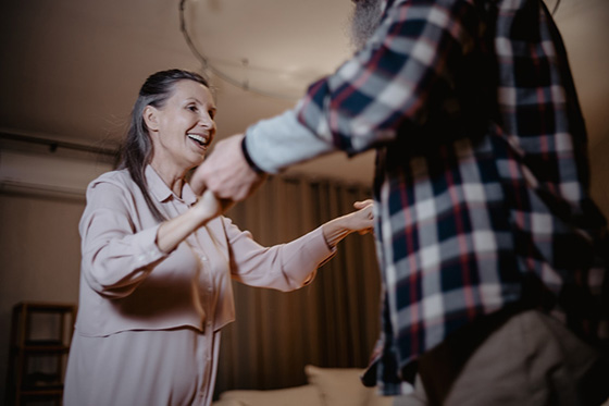 elderly couple dancing